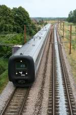 DSB IC3 5060  Thyra Danebod  auf dem Weg nach Fredericia am 29.6.2008 bei Ejby(Fyn).
