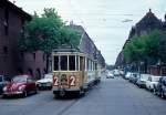 København / Kopenhagen Københavns Sporveje (KS) SL 2 (Großraumtriebwagen 515) Frederiksberg, Holger Danskes Vej am 4. Juni 1969. - Im Sommer 1969 gab es nur ganz wenige Kurse mit den Großraumwagen, die in den Jahren 1930 bis 1941 von der Hauptwerkstätte der Kopenhagener Strassenbahnen gebaut worden waren. - Auf der Linie 2 fuhr der Triebwagen 515 (mit einem Großraumbeiwagen) am Morgen des 4. Juni als E-Wagen zwischen Sundbyvester Plads (auf der Insel Amager) und Nordre Fasanvej (Frederiksberg, Schleife: Ærøvej - Holgers Danskes Vej - Nordre Fasanvej). - Scan eines Diapositivs.