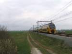 dd-irm-regiorunner Ein V-IRM zwischen Zwolle und Leeuwarden bei Nijeholtwolde am 11-4-2010.