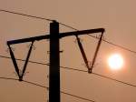 Ein Oberleitungsmasten im Sonnenuntergang. (12.01.10)   ...