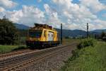 Am 08.08.2014 fuhr dieser OMF von DB Bahnbau Gruppe der Baureihe 706 bei Kollmarsreute in Richutng Norden.