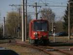 8701 wartet als Schienenschleifzug auf die Fahrt in Richtung Klettenburg am Endbahnhof Thielenbruch am 09.03.2014  Dieses Bild wurde von einem öffendlichen Parkplatz aus fotografiert.