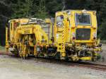 Plasser & Theurer Universal- Stopf- und Richtmaschine 08- 75/4 (97 43 43 514 10 -1) der Erfurter Gleisbau GmbH, 99092 Erfurt abgestellt im Bahnhof Stiege am 25. April 2015.