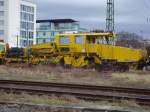 Schotterprofiliermaschine vom Typ USP 2000 SWS der DGT steht steht auf dem Abstellgleis 357 in Freiburg. 09.02.09