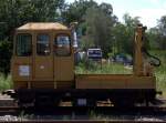 SKL 25 , noch im typischen Gelb der DR, vom Zahn der Zeit schon etwas angenagt steht abgestellt im Bahnhof Zinnowitz.  02.07.12  12:58 Uhr