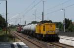 Und nochmal ein Blick von hinten auf die Fuhre. 203 306-6 und 203 302-5 mit einem Spritzzug bei der Ausfahrt aus dem Bahnhof Philippsburg. Aufgenommen am 30.06.2012.