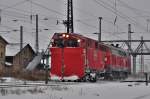 auf zu neuen Rumfahrten auf die Insel Rgen, 218 139 schiebt ihren Schneepflug am 02.12.2010 aus dem Bf Stralsund