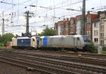 185 692-1 von Railpool und die 1216 953-0 von der Wiener Lokalbahn stehen im Aachener-HBF abgestellt bei Wolken am 16.7.2012.