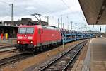 Durchfahrt am Nachmittag des 25.09.2019 von 185 102-1 mit einem  Ford -Autozug über Gleis 1 durch den Badischen Bahnhof von Basel in Richtung Rangierbahnhof Muttenz.