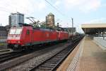 Am 04.10.2014 fuhr 185 110-4 zusammen mit 185 104-7 und einem gemischten Güterzug durch den Badischen Bahnhof von Basel gen Muttenz.