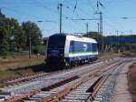 Ein Teil beladener Holzwagen wurde,am 26.Juni 2015,in Bergen/Rügen,von der IntEgro 223 152 abgestellt,danach mußten die letzten leeren Wagen,für die Beladung,auf der Ladestraße