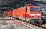 Hier 114 037-5 mit einer RB14 von Nauen nach Berlin Schönefeld Flughafen, bei der Ausfahrt am 30.1.2012 aus Berlin Hbf.