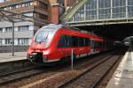 Hier 442 834-8 und 442 137-6 als RB14 (RB18921)  Airport-Express  von Nauen nach Berlin Schönefeld Flughafen, bei der Ausfahrt am 14.7.2014 aus Berlin Ostbahnhof.