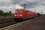 Hier 185 206-0 und 185 235-9 mit einem Schttgutwagenzug, bei der Durchfahrt am 28.6.2013 durch Berlin Schnefeld Flughafen, in Richtung Genshagener Heide.