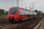 Hier 442 133-5 als Leerzug von Berlin Lichtenberg nach Wnsdorf-Waldstadt, bei der Durchfahrt am 28.6.2013 durch Berlin Schnefeld Flughafen, in Richtung Genshagener Heide.