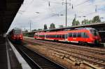 Hier links 442 320-8 als RE7 (RE18717)  Airport-Express  von Berlin Schönefeld Flughafen nach Dessau Hbf.