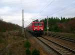 143 130 zieht eine RB von Lutherstadt Wittenberg kommend und hlt gleich im Bahnhof Burgkemnitz.