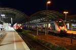 146 022 der Elbe-Saale-Bahn (DB Regio Südost) als RE 16336 (RE30) von Halle(Saale)Hbf nach Magdeburg Hbf sowie 9442 613 und ein weiterer 9442 (Bombardier Talent 2) als RE 74716 (RE9) von