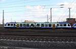 648 784-6 LINT 41 HEX VT 806 mit Werbung Bodetal als HEX 80939 Halberstadt - Halle, KBS 330 Goslar - Halle, fotografiert bei Einfahrt in Halle Saale Hbf. in Höhe Berliner Brücke am 20.02.2012