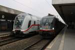 242.517  Fitzgerald  (182 517-3) mit LOC 1818 von Stuttgart Hbf nach Berlin-Lichtenberg sowie IC 2037 (Linie 56) von Norddeich Mole nach Leipzig Hbf stehen in Hannover Hbf.