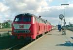 218 489 mit IC 826  Theodor Storm  (Nrnberg–Kln–Westerland) am 06.04.1997 in Heide (Holst)