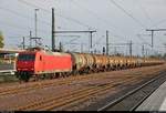 Kesselzug mit 145 092-3 der Beacon Rail Leasing Ltd., vermietet an die HSL Logistik GmbH, durchfährt Magdeburg Hbf in nördlicher Richtung.