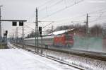 101 057-8 mit dem IC 2385 von Berlin Sdkreuz nach Karlsruhe Hbf in Rathenow. 22.01.2013