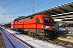 182 019-0 verlässt am 14.02.2021 mit dem RE1 (RE4312)  Hanse-Express  nach Hamburg Hauptbahnhof den Rostocker Hauptbahnhof. 