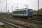 155 048-6 der IntEgro Verkehr GmbH ist bei Dauerregen im Bahnhof Stendal abgestellt.