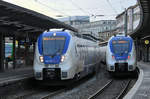 Die National Express-Elektrotriebzüge 374 & 870 am Hauptbahnhof Wuppertal. (Februar 2021)