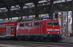 111 117 mit dem RE10422 aus Dortmund bei der Einfahrt in den Endbahnhof Aachen, ca. 28 Minuten spter fhrt er wieder als RE10431 zurck nach Dortmund, 25.4.10