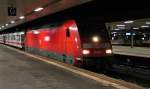 Lokportrait von der 101 048-7, als sie am Morgen des 13.02.2014 mit dem IC 61419 (Duisburg Hbf - Basel SBB)/ CNL 40419 (Amsterdam CS - Zürich HB)/ CNL 479 (Hamburg-Altona - Zürich HB) in Basel Bad Bf beim Personalwechsel steht.