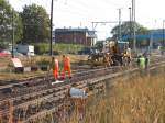 Gleisarbeiten Morgen`s kurz nach 7:00 Uhr,am 14.August 2014,auf dem Bahnhof in Bergen/Rügen.