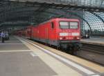 Hier 114 034-2 mit einem RE1 von Brandenburg Hbf. nach Berlin Ostbahnhof, bei der Ausfahrt am 18.6.2011 aus Berlin Hbf.