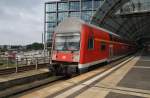 Hier eine RB14 (RB18915)  Airport-Express  von Nauen nach Berlin Schönefeld Flughafen, bei der Ausfahrt am 14.7.2014 aus Berlin Hbf. Schublok war 143 848-0. 