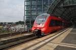 Hier 442 827-2 als RE7 (RE18714)  Airport-Express  von Dessau Hbf. nach Wünsdorf-Waldstadt, bei der Ausfahrt am 14.7.2014 aus Berlin Hbf. 