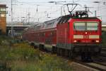 143 821-7 mit dem RB 14 (RB 18931) aus Nauen bei der Einfahrt in den Bahnhof  Berlin Schnefeld Flughafen am 18. August  2011