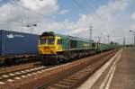 Hier 3 650 006-1 mit einem Gterzug, bei der Durchfahrt am 1.7.2013 durch Berlin Schnefeld Flughafen, in Richtung Genshagener Heide.