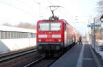 143 955 steht am 25.01.09 mit der RB nach Lutherstadt Wittenberg im Bahnhof Burgemnitz.