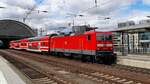 Am 13.4.23 war 143 933 der S-Bahn Dresden als S2 nach Pirna unterwegs, hier bei der Ausfahrt aus Dresden Hbf.