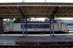 386 011-1 Metrans als Containerzug durchfährt den Bahnhof Falkenberg(Elster).