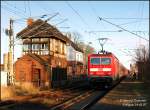 143 305 verlt den Hp Uebigau mit RB28155 Falkenberg/E.-Cottbus, 14.01.07.