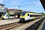 DB Regio Siemens Mireo 463 522-3 und Bombardier Talent2 8442 701 im Bwegt Design am 09.07.23 in Freiburg Hbf