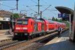 Am Mittag des 12.07.2013 stand 146 236-5  Schwarzwaldbahn Erlebnispfad  mit dem RE 26513 (Offenburg - Basel Bad Bf) beim Zwischenhalt auf Gleis 4 des Hauptbahnhof in Freiburg.