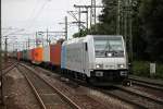 Am 13.08.2014 fuhr METRANS 185 691-3 mit einem Kistenzug in Richtung Hamburger Hafen durch Hamburg Harburg.