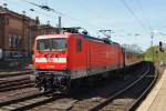Hier 112 153 mit RE21070  SH-Express  von Hamburg Hbf. nach Flensburg, bei der Ausfahrt am 16.4.2014 aus Hamburg Hbf. 