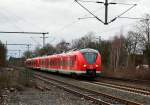 Am verregneten und grauen Donnerstag den 15.1.2015 macht sich ein S8 Zug auf den Weg nach Hagen der vom 1440 306-7 geführt wird, hier ist er bei der Einfahrt in Korschenbroich zu sehen.