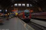 RB54 (RB 26112/RB 17871) von Leipzig Hbf nach Lutherstadt Wittenberg ber Dessau im weihnachtlichen Leipziger Hbf und geschoben hatte die 143 034-7. 30.11.2013