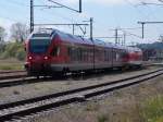 Als RE 13011 von Rostock ging es nach dem Halt in Lietzow,am 15.Mai 2014,für den 429 026 weiter nach Sassnitz.