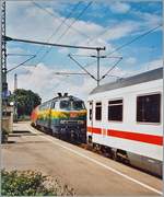 Nach dem Wegfall der DB ICE -TD 605 verkehrt das Zugspaar EC 195/196 mit DB Wagenmaterial. Das Bild zeigt die DB 218 418-2 und die 440-6 bei der Übernahme in Lindau des aus Zürich eingetroffen EC. 

Analogbild vom 27. Juli 2004